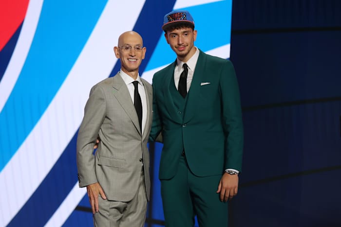 Alperen Sengun (Besiktas, Turkey) poses with NBA commissioner Adam Silver after being selected as the number sixteen overall pick by the Oklahoma City Thunder in the first round of the 2021 NBA Draft at Barclays Center.